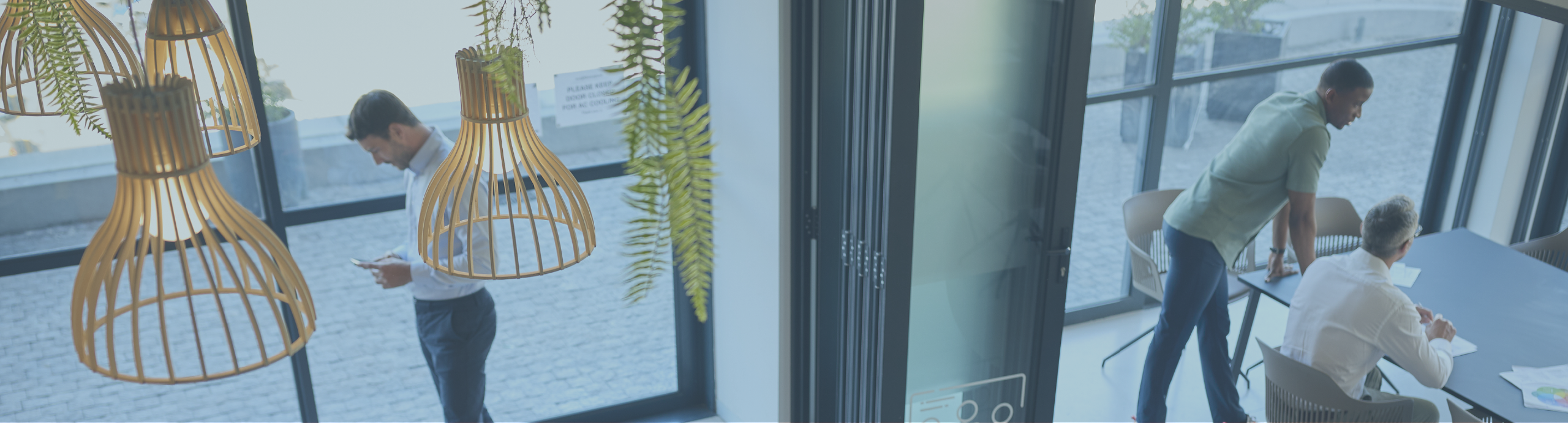 High angle view of a diverse group of businesspeople talking together around a conference table during a boardroom meeting in an office