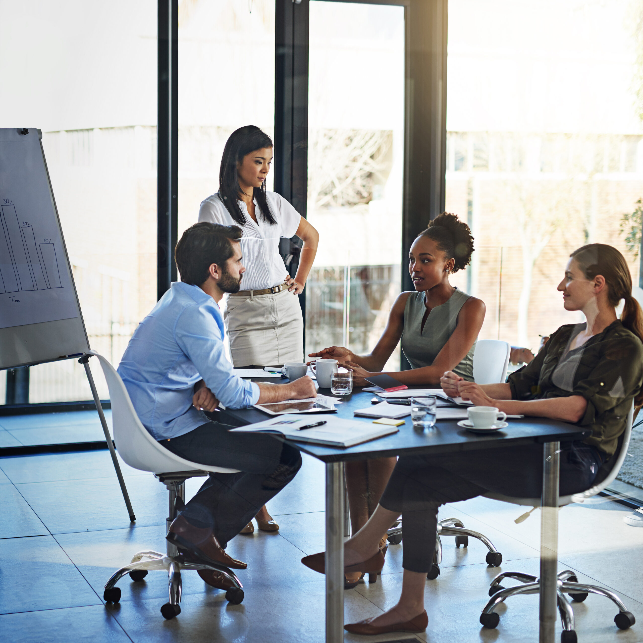 Shot of a group of colleagues working together in an office